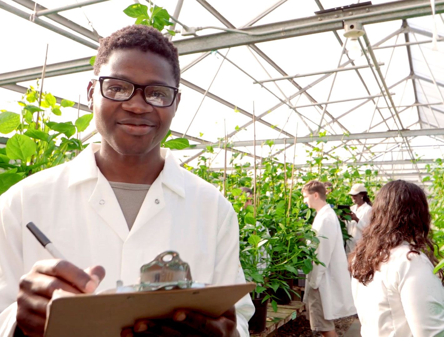 students in greenhouse
